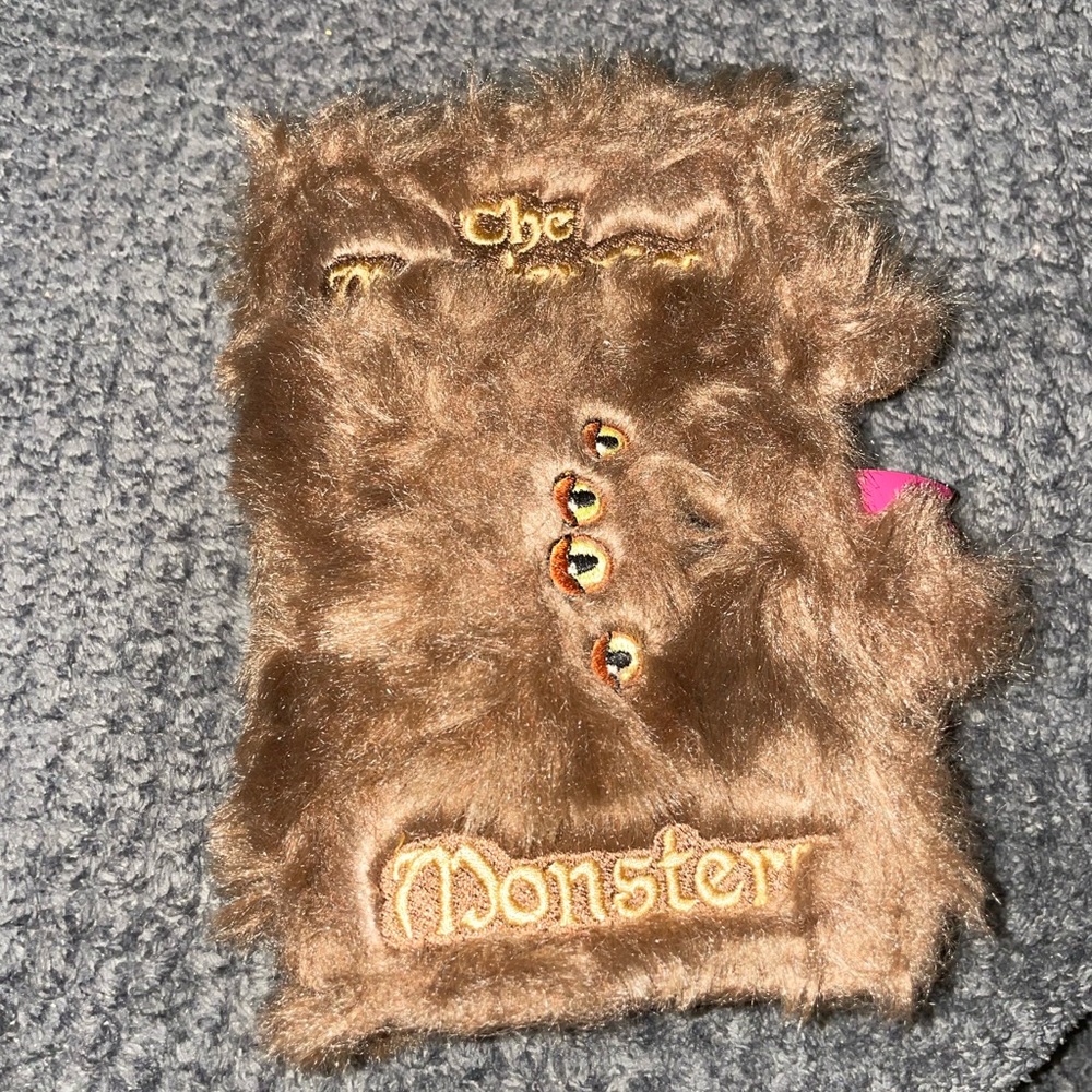 Wizarding World of Harry Potter iPhone Monster Book of Monsters Wallet Case